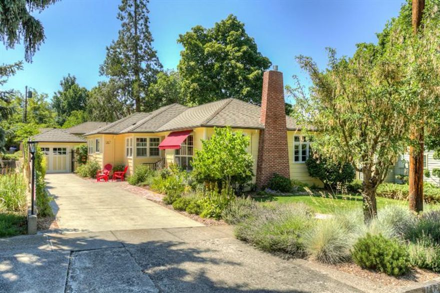 Fabulous 1945 home with separate cottage. You will love this immaculate property. Thoroughly remodeled main house with attention to detail so the period was restored and preserved where possible. Charming new retro-style kitchen w/ custom cabinets & stainless appliances. Hardwood floors in most of the home. Lovely living room w/ gas fireplace. Tranquil master suite with a beautiful, new master bathroom featuring marble flooring and counters. Main living area is all one level with a finished basement suitable as a rec room, workout room or theater room. This home has updated insulation, electrical panels, plumbing & more. The absolutely adorable cottage was built in 2012 and received an award for historic replication. It has a separate entrance, patio, and garage. The yard, installed in 2012, features sweet garden areas, raised veggie planter, cold frame, babbling rock water feature & a large back patio covered by an electric retractable awning.