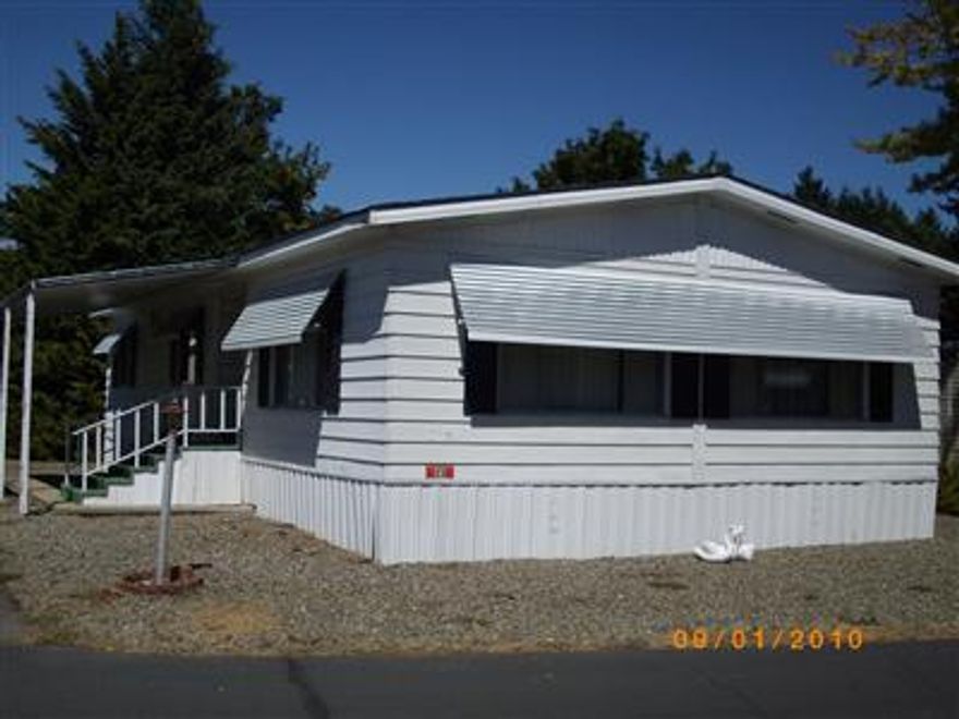 Must have BCD lic. to list or sell. Mobile Home Only for sale. BIG PRICE REDUCTION!!! Well maintained double wide in 55+ Senior Park ready and waiting for its new occupant. 2 bedroom - 2 bath and it even has a family room... Approx. 1056 sq. feet of living space. Large rear deck with awing to sit under and enjoy the peace and quiet of this park. Space rent is currently $260.00 and includes water, sewer and trash.