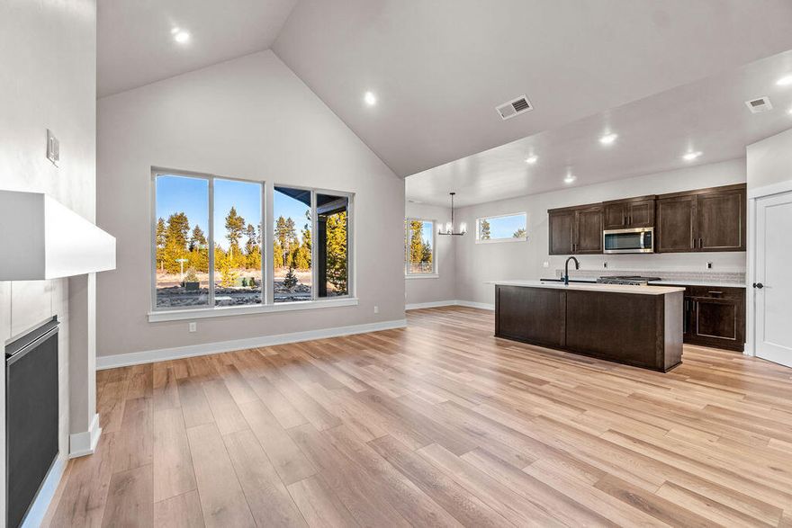 **Huge incentive available on this home with a 4.625% first year interest rate on a 2/1 buydown with builders affiliated lender. Restrictions apply.** This beautiful home sits on a corner lot, with private space directly behind you and is move-in ready! The popular 3-car Chapman floorplan, set on a corner lot, built by our quality award winning builder is well designed with a spacious great room and kitchen for entertaining all of your family/guests. The primary suite is thoughtfully placed separate from the other bedrooms. As in all Pahlisch Homes, well-crafted finishes are used such as solid Quartz counters, luxury wood laminate flooring, shaker cabinets, fireplace, 6-inch baseboards, Xeriscape front landscaping and A/C. Homeowners and residents here will have access to a full spectrum of private recreational amenities including the clubhouse w/ a gym, parks, green spaces, and paved walking paths. Visit the model home Friday-Sunday from 12-4pm.