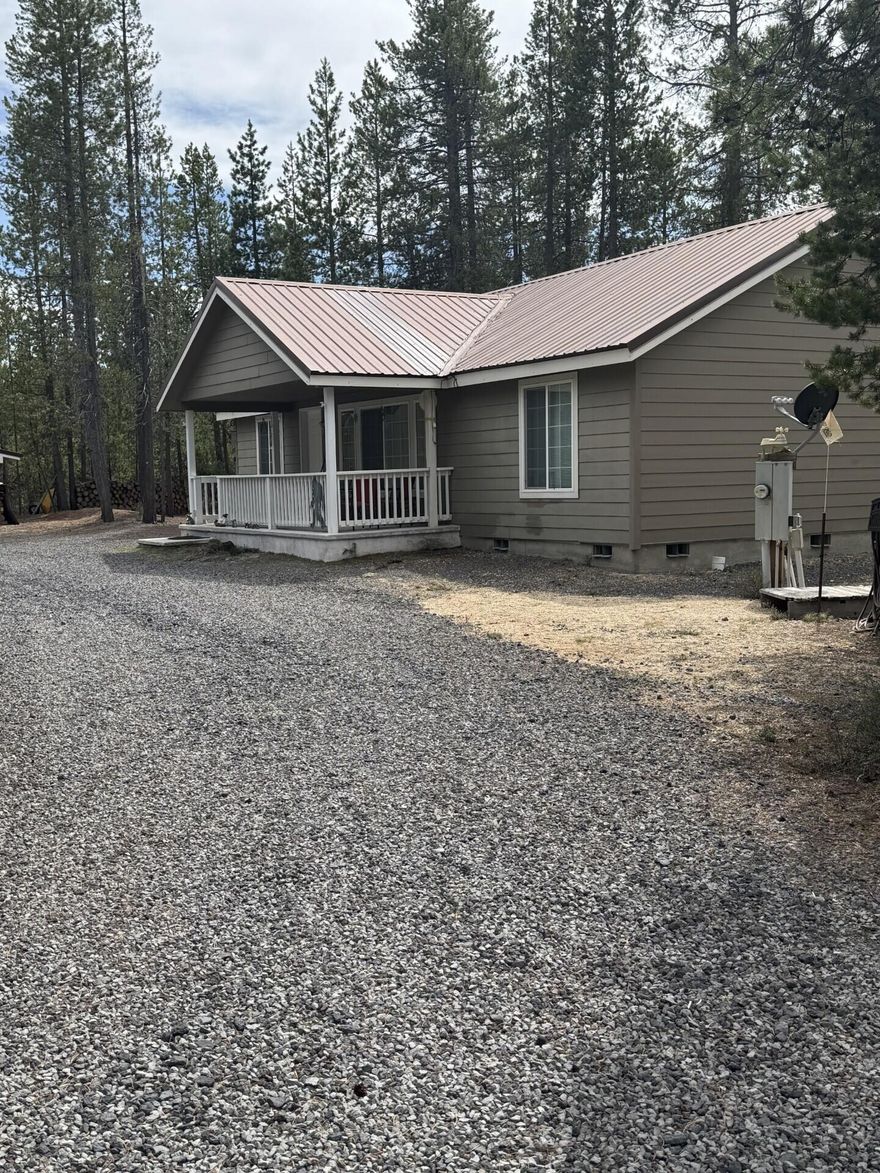 Just a few steps away from the Little Deschutes River. This well cared for 3 bedroom 2 bathroom home sits on over an acre That borders the National Forest. The property includes a large insulated shop, extra storage building and a circular driveway. Go fishing swimming, hiking, ATV riding and snowmobiling from your backyard. Two Rivers North Subdivision is minutes away from Crescent, Odell, Miller and numerous other high mountain Lakes, trails and Willamette Pass Ski Resort.