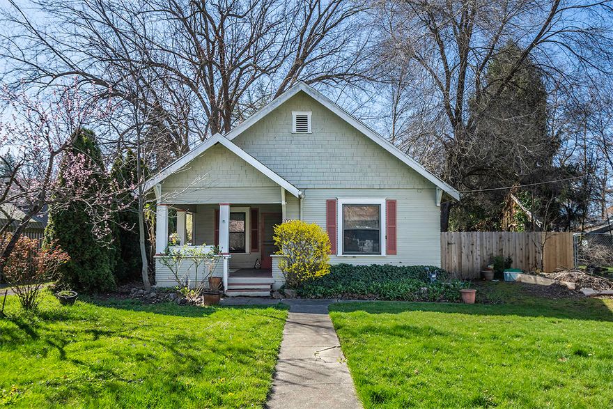 East Medford charming craftsman home with lots of original features and built ins. 9' ceilings, crown molding and original hardwood fir floors throughout. 2 bedrooms plus a den or 3rd bedroom. One large bathroom, laundry room and a pull down ladder that leads to a huge 800 sf attic. Seller has had approval from city to create 800 sf of living space. The backyard is an oasis with mature shade trees and hot tub. Fidelity Nation Home Warranty included.