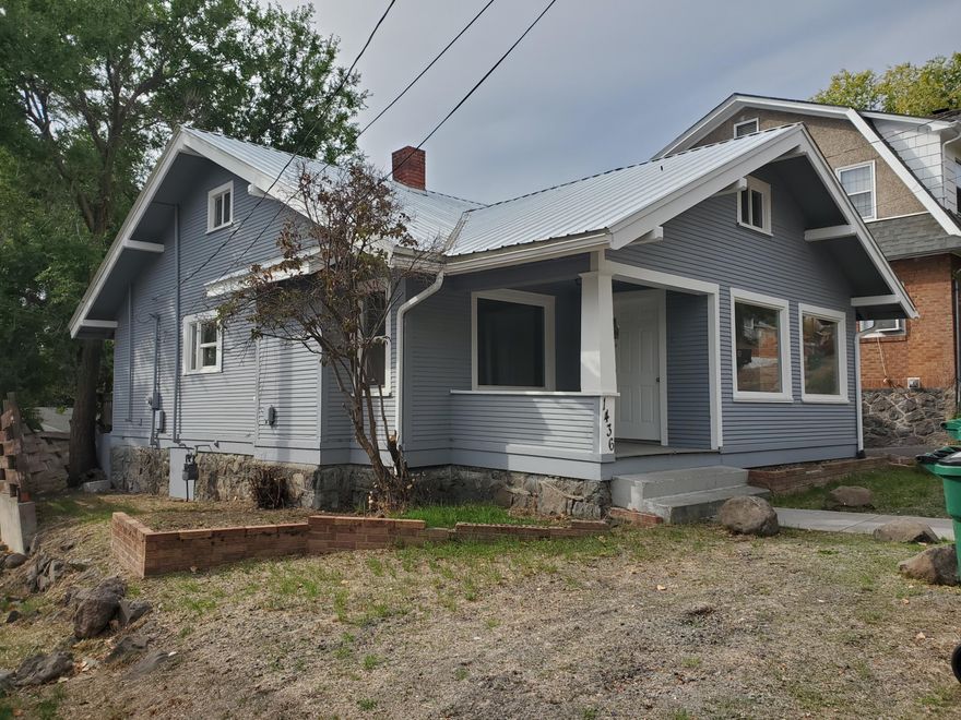 This charming home has all kinds of character! Two bedrooms, one bathroom on the main floor, with another bathroom and extra space downstairs that could be just about anything you would like. An office, game room, work out space....just to name a few options. Exterior is newly painted. Main level interior has new paint as well. New kitchen flooring. New gas heater. The renovations have been started, so come finish them up and make it your own! A lot of potential here! Complete with garage that includes a workbench.