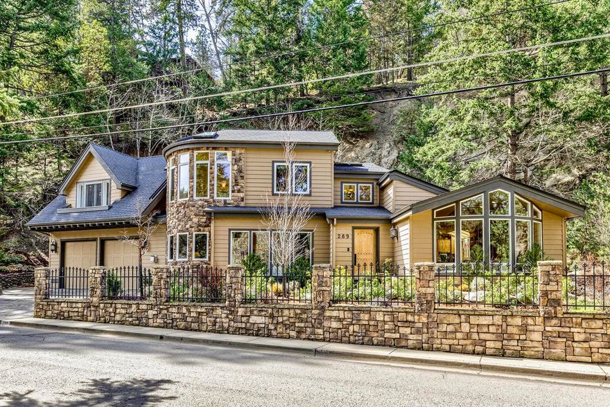 This home sits across from Ashland's Lithia Park where you not only have its beauty but quick access to trail systems and downtown. Remodeled in 2014, the home was originally designed by Carlos Delgado. Lots of natural light with skylights, bay & A-frame windows, vaulted ceilings, hardwood floors through most of the home and custom cabinetry complement the design. The Kitchen is a chef's dream with high-end appliances, Staron countertops, 2 sinks & easy access to the side patio with natural gas BBQ hook-up. Upstairs is a second living space with office, adjacent to kitchenette/wet bar. The owner's suite offers dual walk-in closets, gas fireplace, bathroom with steam walk-in tile shower, 2 sinks & soaking tub.  The oversized double car garage has a temp controlled wine storage room & additional rear roll-up door to back patio. Outdoor living on the large back to side patio is accentuated with mature plantings and built in lighting. See attached Features Sheet & don't miss the 3D Tour.