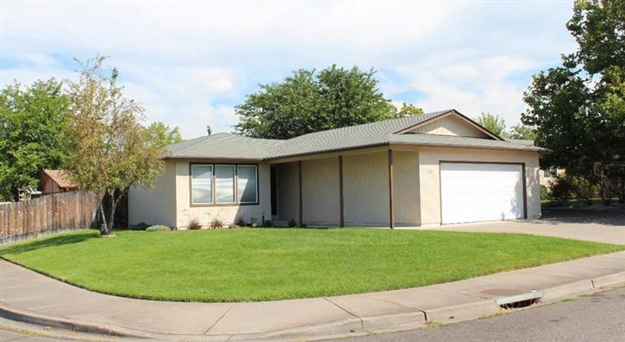 Wonderful home on a large corner lot is ready and waiting for new owners! Super clean 3 bedroom 2 bath home has newer carpet and laminate flooring. Warm and inviting sunken living room. Spacious kitchen w/wood cabinetry, ample counter space & matching appliances. Nice sized dining room open to family room w/laminate flooring & sliding glass door to back yard. Light and bright master suite w/attached bath. Nice fenced back yard w/patio and in-ground sprinklers & raised garden bed. Attached 2 car garage, large RV parking area w/gated entrance plus additional small RV parking area w/separate gated entrance. This great home is located in a quiet established neighborhood and is just waiting to welcome you home!