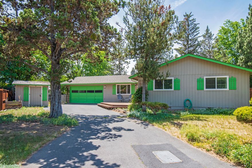 Perfect single level starter home on a quarter acre lot in a quiet NE Bend cul-de-sac! Don't miss this fantastic opportunity to make this home yours and everything you envision it to be! Home features new heat pump and furnace with A/C, large living room with beautiful vintage wood stove and lava rock surround, separate dining area, kitchen with newer appliances and additional eating area or living space, large laundry room and pantry, primary suite and attached bath with tile counters and floors, two spare bedrooms with full sized hall bath and shower/tub combo. Outside features include 2 storage sheds, newer roof, front deck, rear patio and rear deck with pergola and lots of space for yard and landscaping.