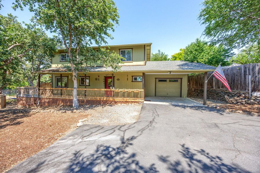 What a Gem!  This beautiful, lovingly maintained contemporary abode in Phoenix is a must see! Home is set back off the street on a flag lot so it is very private and quiet. One car garage has been converted into a bonus room, or gym-could be converted back, wall heaters in baths, dual thermostats both upstairs and down. Spacious upper and lower decks, large windows, flowing floor-plan, separate living and family rooms and much more.  Truly a wonderful place to call home!