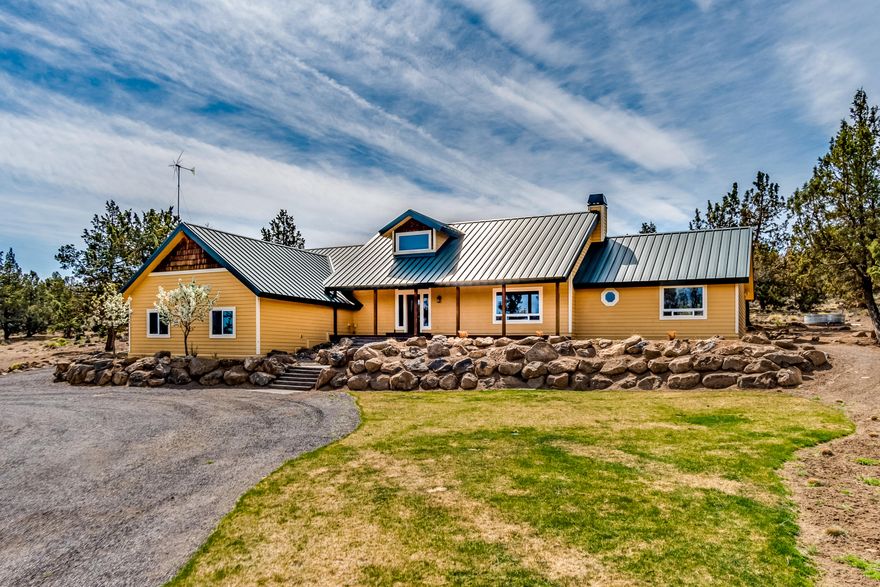 Incredible Tumalo Acreage Hobby Ranch/Horse Property with Unmatched Green Energy Build. Sitting on 19.27 acres, this beautiful Ranch Style Home, originally designed to be off the grid, has been brought onto the grid by the current owners. The 2,739 sq ft property built with ICF Construction was constructed to take advantage of passive solar heat in the winter, and passive cooling in the summer. The open concept floorplan features vaulted ceilings in the Great Room/Dining/Kitchen area. All living space is on the Main Level of the property, with an open air loft on the second level. Additional Green features include a Single Access Solar Panel and Wind Mill, both located adjacent to the home. The property also features a sealed battery backup and state of the art inverter, both updated in 2020. A new Barn/Shop was added to the property in 2018 and features a 2,450 square foot footprint and twin 14 Foot doors. 10 Acres of Swalley Irrigation rights run with the
property.