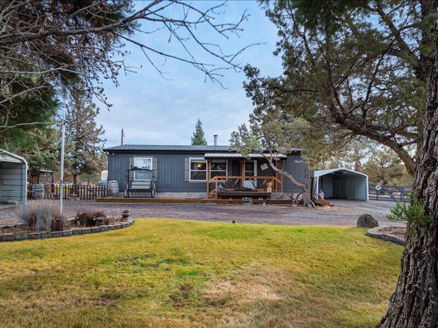 Discover this Tetherow Crossing Oasis.  This picturesque 2.92 acres property offers a scenic pond perfect for morning coffee moments.  Ideal for the horse lovers, this property is fenced and cross fenced & includes a spacious shop 24'X 30' (approx)   and more out buildings for all of your stuff.  Mature landscaping brings beauty and privacy to this stand out property.  
Please call your favorite Realtor for a personal showing of this wonderful Oasis,