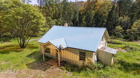 Photo of 5525 Caves Highway, Cave Junction, OR 97523 (MLS # 220220241)