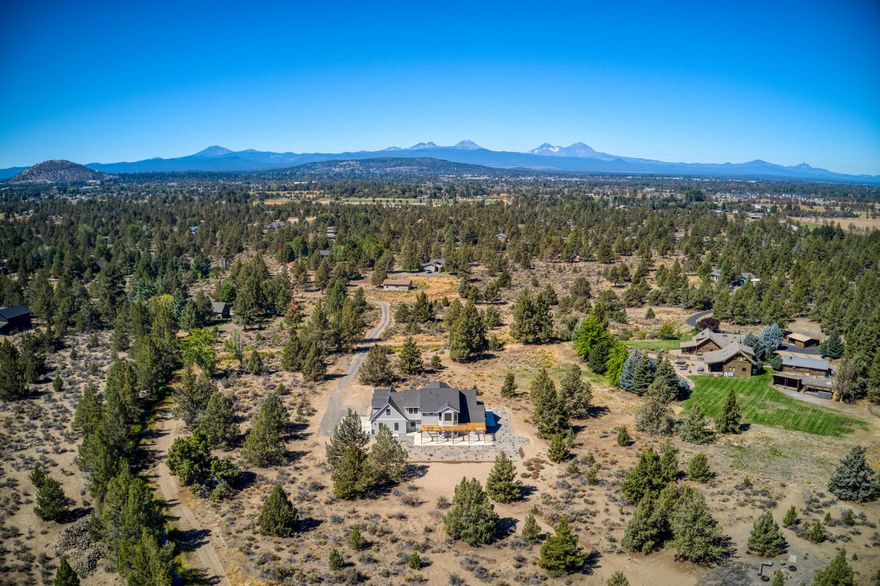 A rare opportunity to purchase a brand new luxury custom home on 10 acres. This bright open Northwest Craftsman-style home features 2 primary suites, one on the main floor and another on the second floor. The home also features a large studio, a large loft area, and an additional large office perfect for working from home. The soaring ceilings and the luxurious oversized chiefs kitchen are sure to please. Features a large main island, generous counter space, custom Medallion cabinetry with glass faces, quartz countertops, full-height tile backsplash, undercabinet lighting, and a luxury stainless steel appliance package. Appliances include a gas 10 burner Bluestar 60'' range with double ovens, 60'' luxury Bluestar range hood, under cabinet fridge, Built-in large Subzero fridge freezer, Sharp microwave drawer, and a beautiful Krauss sink. Additionally, this home features a 4-zone efficient HVAC system, Upgraded insulation, an oversized 3-car garage, 400 amp service, and much more.