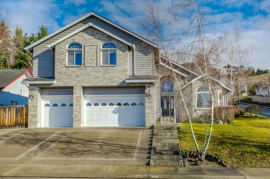 This is a beautiful Pagnini built home with four large bedrooms, two full baths, and a half bath on the first floor. As you go through the front door, there are soaring 22 ft ceilings, oak hardwood floors, beautiful granite in the kitchen and large picture windows throughout allowing great natural light into the home. It has a beautifully landscaped private backyard, great curb appeal, large RV parking, in a desirable East Medford neighborhood and on a .25 acre lot. Such a find and very east so show!