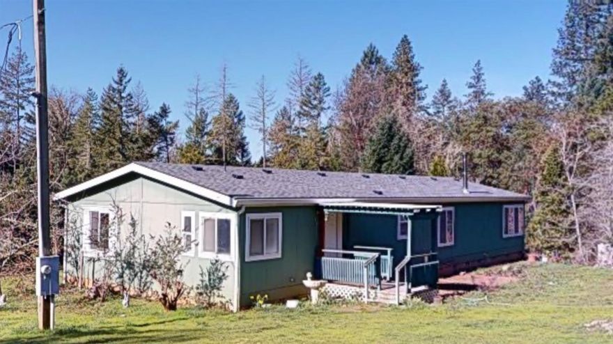 Quiet and Secluded 20 acres that is backed up to BLM land. Approximately 1848 sq ft 3bdrm, 2bath manufactured home. Large fenced in garden area, 2 bay door shop that is app. 36 by 24. Storage shed and building on site. Sit on the front porch and enjoy the beautiful views. It will exceed your expectations!! All information is deemed reliable, and not verified.