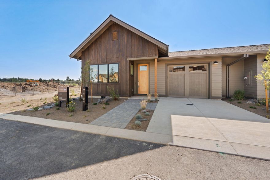 Enjoy the ease of single-level living in this new Cottage at Highlands Ridge, ideally located just a short distance from the homeowner's pool, Tetherow Sport pool and fitness center, golf, and miles of public lands and trails. Inside, the bright and open layout feels surprisingly spacious, with a large kitchen, sizable island for countertop dining, as well as connected living and dining areas. Two private king suites sit at the back of the home and offer a quiet place to recharge. With landscaping included in the HOA dues, you will be able to skip the maintenance and enjoy more time on the sizable and private back patio with pergola and hookups for a hot tub and fire pit. Whether you're seeking a lock-and-leave getaway, a long term rental, or a stylish full-time basecamp, this home checks the box. Some photos shown are of a similar home.