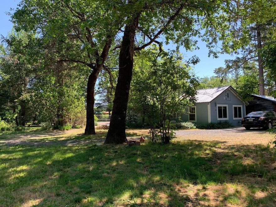 Make an appointment today to view this cute country home! This well-maintained home is a 3+1 bath, 1292 Square feet on 2.98 acres. Move in Ready! Recent well flow text 13 GPM, septic has been pumped and inspected,  Full home inspection has been completed. A copy of all reports available by request. Two heat sources Oil heater & a pellet stove with all new components. The home has many upgrades. New flooring, interior and exterior painting that was just completed in the last year., new metal roof approximately 4 years old, LED lights throughout the entire home, and a tankless on demand water heater and much more. Property is completely fenced for privacy. Multiple outbuildings, a workshop, hay barn, or can be used for storage. Large pump house with room for storage and a finished room that is a bonus room could be used for guest quarters or a craft room.  There is a fenced garden area and fruit trees. Even a great area for a horse. Property is mostly level, private, with plenty of tree