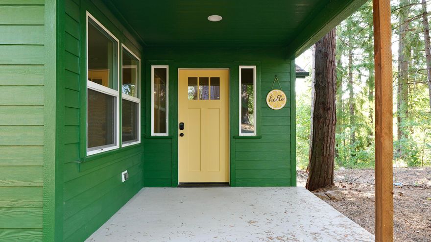 Extensively remodeled in a peaceful forest setting! This quality-built 3-bedroom, 2.5-bath home offers 1,615 sq. ft. of higher-end finishes throughout, including SmartCore waterproof laminate flooring, Hardy Plank siding, a heat pump, and an energy-efficient Stiebel Eltron water heater. The spacious primary suite features a private office, perfect for working from home. Relax and enjoy the surroundings from your covered deck, nestled on 2.53 acres across two tax lots, zoned RR5. A good producing well and Nye Ditch irrigation rights add to the property's value. Plus, there's an oversized 18x36 garage/shop, offering plenty of room for storage, hobbies, or parking. A great combination of modern comfort and country living! Just minutes from endless outdoor adventures—Rogue River, Lost Creek Lake, Union Creek Resort, Crater Lake National Park and Diamond Lake!