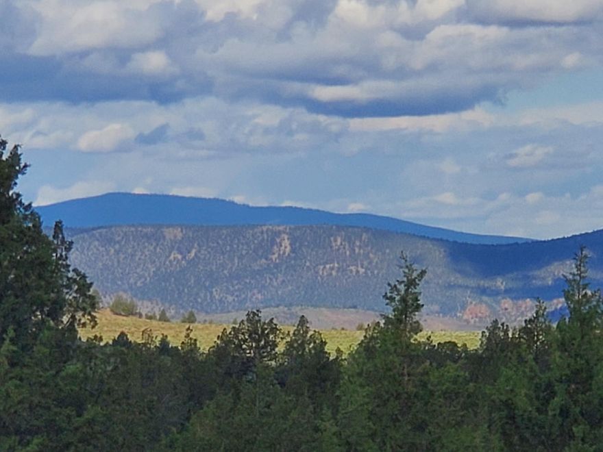 Your Dream Retreat Await. Imagine owning 30.36 acres of pure serenity with breathtaking views of the Cascade Mountains and twinkling city lights. This incredible property, divided into 5 tax lots (sold together), offers endless opportunities for building your dream home, creating an off-grid retreat, or establishing a peaceful campsite.
Stunning Views: Panoramic mountain and city light vistas.
Selller says the area is known for good wells.
Flexible Living Options: Go off-grid or connect to nearby power—your choice!
Spacious and Versatile: Over 20 acres on one side of the road and 10 on the other. Sellers believe the CCRS were abandoned years ago. Buyers to do due diligence on all aspects of the property.
Located in Riverside Ranch, just 25 miles from Prineville and 4 miles from Post, this property is a tranquil escape with easy access to modern conveniences. Plus, SELLER FINANCING AVAILABLE!