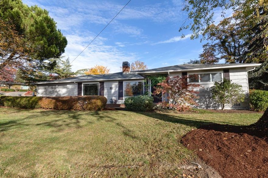 Fantastic location for this 2195 sqft single level home on the 14th hole of the Rogue Valley Country Club and within Hoover school district. Spacious with 3 bed/ 2 bath as well as 2 living areas with cozy fireplaces, large kitchen that includes a breakfast nook area as well as a separate dining area. Just updated with beautiful tile flooring in the kitchen and one of the living areas, fresh paint inside and out, as well as updated refinished counters in the kitchen! Bedrooms and main living room offers solid wood floors. Lots of parking with room for a small RV including double carport and golf cart garage. Small storage shed and private patio for enjoying the serene feel of golf course living!