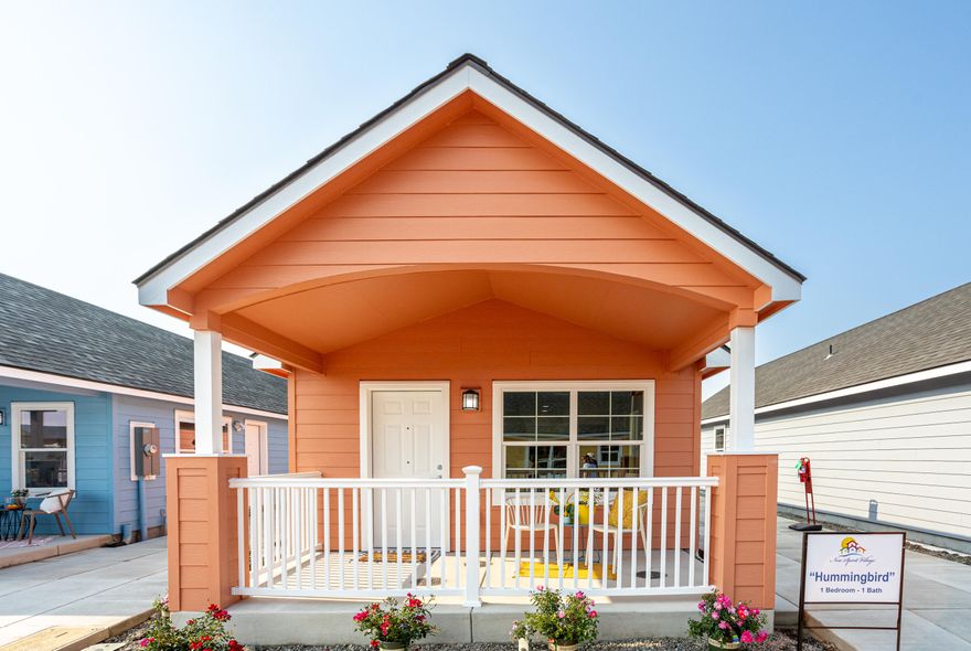 Qualifies for Amplify Oregon—an equity-builder mortgage with no PMI, no funding fee, no down payment (100% financing), interest rates in the 4s, and a 20-year term. Meet the ''Hummingbird,'' an innovative 1 bed/1 bath, single-level home in New Spirit Village. Energy-smart frame construction with a ductless heat pump, LVP throughout, and an open living/kitchen. Refrigerator, washer, and dryer included. Enjoy a private rear patio, fenced backyard with durable vinyl, and an exterior storage shed—great for bikes and tools. Adjacent to 8-acre Lewis Park with trails, playgrounds, splash pad, and a basketball court. New Spirit Village's pay-it-forward Community Land Trust keeps prices below market and preserves long-term affordability (resale, owner-occupancy, income, and other restrictions apply). Estimated completion 11/28/25; photos for illustration only. Tour the model today; ask how Amplify Oregon can help build equity faster and lower monthly costs.