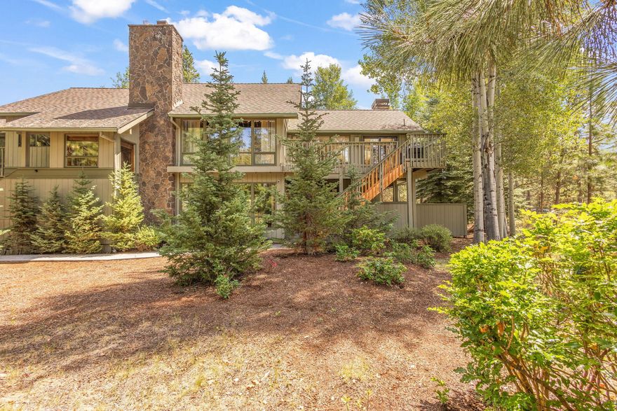 This original Northwest style home offers over 3,500 sq ft of updated living space, perfectly suited for a vacation getaway, second home or dual living. Featuring two kitchens-one upstairs and one down-this home provides flexible options! It is tucked near the golf course and river, the property has the classic Sunriver-style charm. Enjoy spacious living areas, abundant lighting, and an easy flow to outdoor spaces. Ample parking, close proximity to the village and room for everyone. This home blends comfort, convenience and Central Oregon adventure.