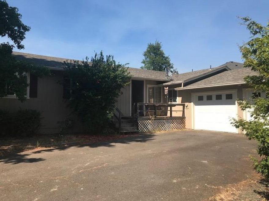 This home is very nice, perfect for a family, investor, or empty nesters. Gorgeous gourmet kitchen with all the upgrades; Silestone Quartz countertops, new white cabinets, double wall ovens, flat range top, stainless steel appliances, soft closed drawers and cupboards, lazy susan in corner cabinets, recycle pullouts, all the bells and whistles! 2 car garage that is extra deep with two separate garage doors. 1/2 bath has been completely remodeled. Inside laundry room. His and her closets in the master. Jacuzzi tub, travertine tile in main bath shower and updated counter. Large back yard with deck for entertaining. Nice separate fenced area for a garden. Nice bonus room off the living area with sliders and new vinyl windows.