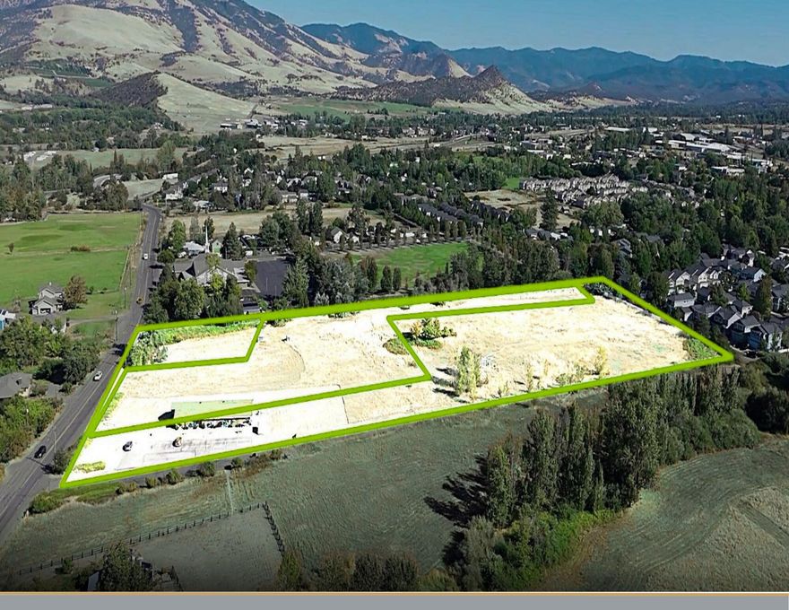 This offering presents a rare opportunity to acquire ±9.71 acres of prime, developable land within Ashland's Normal Neighborhood Plan—the city's designated area for sustainable, mixed-use growth. Consisting of three contiguous parcels with direct East Main Street frontage, the property lies just outside city limits yet within the Urban Growth Boundary, providing a clear and efficient path to annexation. The City has expressed support for development and may establish an Advance Financing District (AFD) to help offset key infrastructure costs such as water, sewer, and roadway extensions, significantly reducing upfront expenses. With nearby utilities, favorable topography, and zoning anticipated as NN-1-5, NN-1-3.5, and NN-1-3.5-C, this assemblage is ideally suited for a balanced blend of residential and neighborhood-scale commercial uses. Offering both short-term feasibility and long-term strategic value, this is one of Ashland's last large mixed-use land opportunities within the UGB.