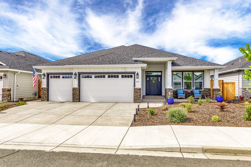 Welcome home to your custom-built home offering 2303 square feet of luxurious living space featuring 4 bedrooms and 2 baths. Situated in the Eagle Point Golf Community your lot features a spacious backyard beautifully landscaped with raised beds on drip irrigation, a large covered patio for entertaining all year round and a 3-car garage. The interior of the home offers a great room design with a spacious kitchen that includes custom cabinets, stainless-steel appliances and a large island. The primary bedroom w/ en-suite has a gorgeous dual head tile shower plus a tile surround soaking tub. Built by Preferred Homes in 2021 and loaded with upgrades including custom cabinets, trim package, gas fireplace, beautiful laminate and tile flooring and so much more!