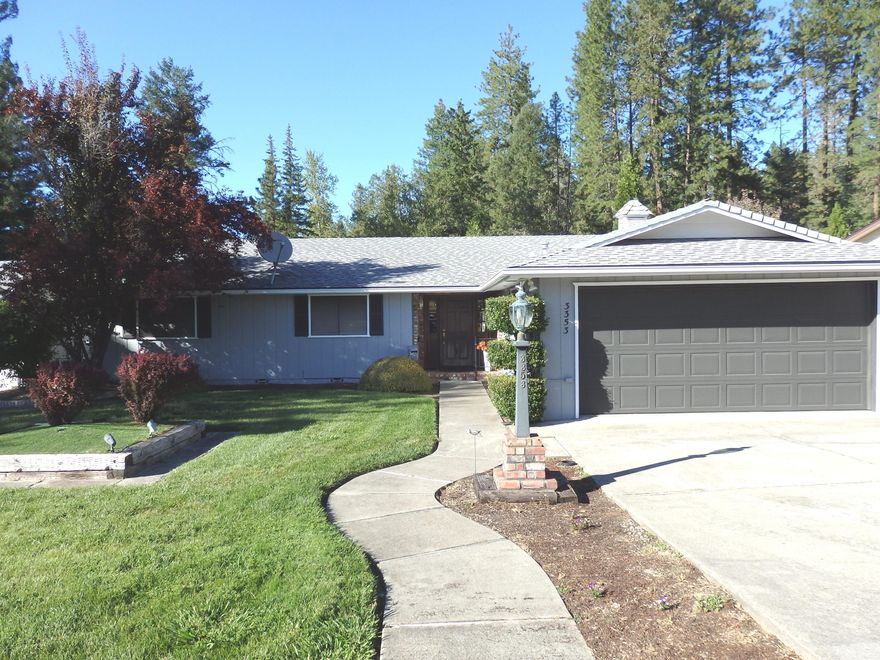 Classic single-level home on large level lot near the Grants Pass Golf Course. Home features living/dining combo, upgraded kitchen w/granite counters, Bosch gas cooktop, double ovens (all stainless appliances), primary suite w/walk-in closet, step-in shower & soaking tub, guest bath w/large step-in shower & tile floor, plus 2 additional bedrooms (master & second bedroom have new carpeting), laundry room w/2 pantries, plus attached 2-car garage. Screen porch. Extra parking. 816 SF separate shop building w/half bath. Small greenhouse. Call today for your personal tour, and welcome home!