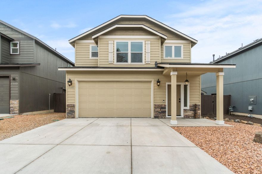 Just minutes from the St. Charles medical community and conveniences like Whole Foods and Rivers' Place, this lightly lived-in two-story former Model Home offers a perfect blend of modern luxury and location. Featuring 3 spacious bedrooms and 2.5 baths, with luxury wide plank flooring throughout, the home's bright, airy interior showcases contemporary elegance. Recently installed solar panels keep energy costs near zero, and smart home features like Alexa-enabled lighting and a Ring doorbell add convenience and security. The kitchen is a culinary masterpiece, opening into a sunny dining area that flows to a new patio and xeriscaped backyard—ideal for low-maintenance outdoor living. A gated section provides extra storage for your outdoor equipment, while the two-car garage, complete with a fun bar area and tiled flooring, serves as a lively man cave.