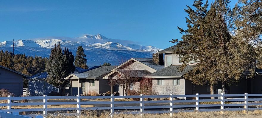 Stunning. It's the only possible way to describe the views from this 59 acre property! The main residence includes an attached 2bed/1bath apartment (not ADU permitted). The kitchen boasts Dacor appliances. The primary suite has 3 walk in closets, a Jacuzzi tub and a walk-in shower. Upstairs there is a wet bar and spectacular views from the 2 balconies. The living room, family room each have a gas fireplace. The very generous sized laundry room has a powder bath. Outside, there's a 10,800 sq. ft covered riding arena with 16 stalls. adjacent to the indoor arena is a roping arena, covered stands and an announcer's box, multiple paddocks, loafing sheds and a round pen. With 30.5 acres of irrigation, you can choose your next crop. Among other structures, there's a manufactured home that is currently uninhabitable. There is a detached 2 car garage along with a 70' deep RV garage and a 2 bay shop.  Broker is related to seller.