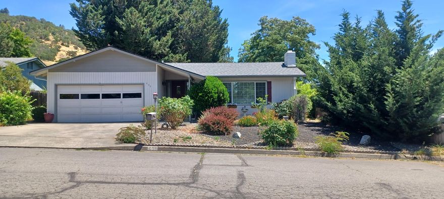 Great location near shopping, schools, dining and amenities! Well maintained and spacious 1753 SF home with 3 bedrooms and 2 full baths.  Front living area includes a cozy wood burning fireplace. Galley kitchen with breakfast bar and step down dining area. Second living area is a great space for entertaining guests. Primary bedroom suite features extra large walk-in closet. Attached double car garage. New roof 3 years ago.
Step out on the large size patio with several seating areas ready for your entertaining with family and friends. Then onto the over-sized backyard beautifully landscaped including raised beds. Attached storage shed is the perfect place to store your outdoor tools. Front yard beautifully landscaped for easy low maintenance. This lovely home is ready for new owners to make it your own and create your memories.