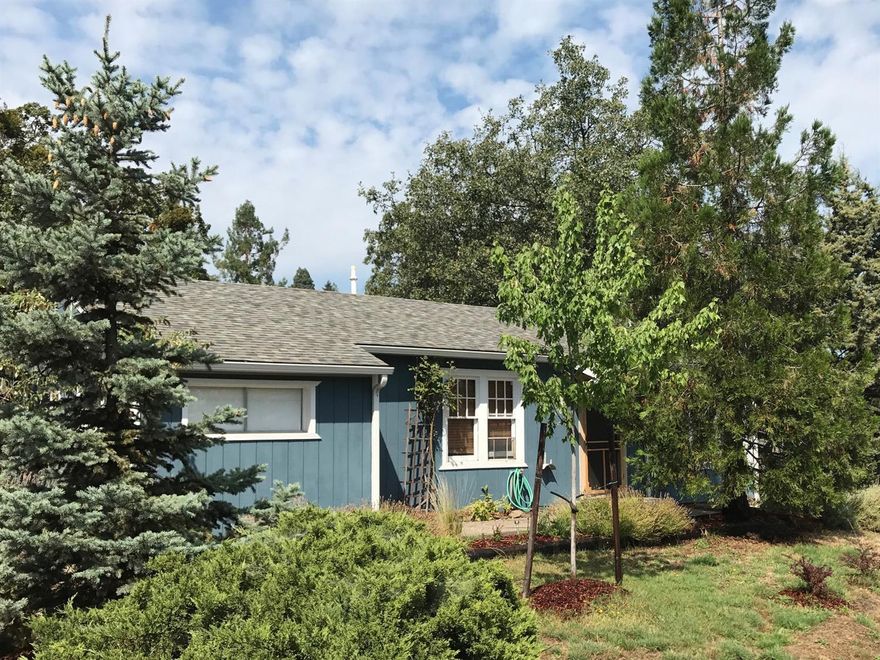 Don't pass this one up! Located in the historic Siskiyou-Hargardine district atop Gresham Street, this property is close to town and boasts great views. It could be an ideal spot for a dream home or a sweet remodel with an additional dwelling unit (check with the City of Ashland for allowed uses). Possibilities abound with a vista towards Grizzly Peak. This property is zoned R-2, is generous in size and sits along an alley. Come check out this opportunity and the views for yourself!