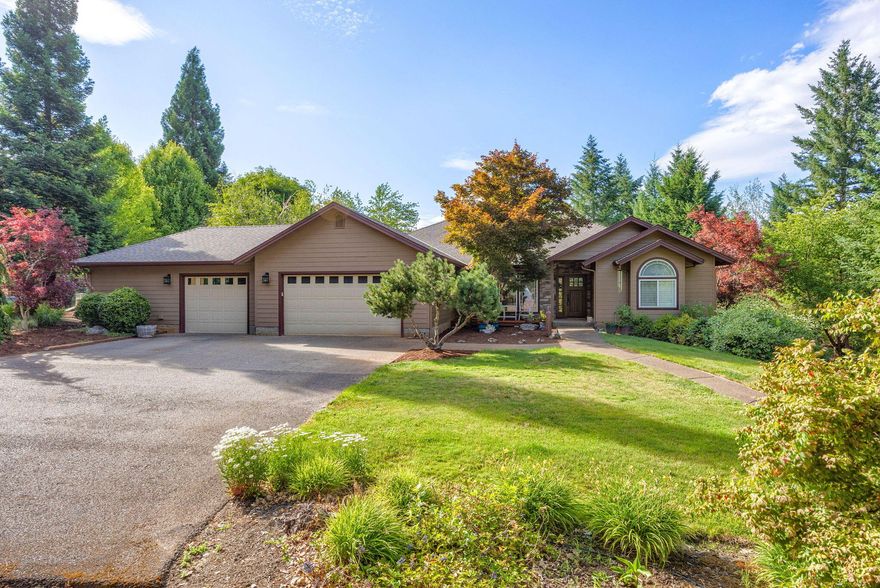 Quality custom home on 5 private acres with guest house, lush landscape, water feature, & gated entry. Located in the desirable Whitestone Subdivision, the 2,382 sq ft main home offers 3 beds, 2.5 baths, stone fireplace with built-ins, arches, hrdwood flrs, rake windows, & a wet bar with wine fridge. Open floor plan includes formal dining, spacious kitchen with granite counters, breakfast nook, pantry, desk, & 3-year-old Bosch appliances. Primary suite has tray ceilings, two large closets, shutters, jetted tub, shower, dual vanities, & skylight. Huge back deck is accessible from the living room, breakfast nook, & primary suite. Cross the bridge to a charming 630 sq ft guest house with full kitchen, living, dining, bedroom, & full bath. The 3-car garage includes a 4th bay for a workshop or studio. Geothermal heating/cooling for lower power bills & generator for power outages!  New roofs hm & gst in 24, fencing, paved driveway, & beautiful entry complete this serene & private property.