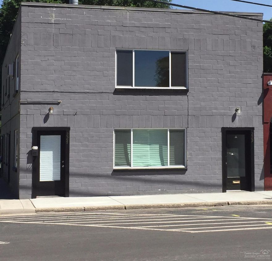 Excellent opportunity to own an income producing property. This downtown building is zoned commercial, but has always been used as a mixed use property with Office/Retail on the lower level & a large 2 bedroom apartment upstairs, and a studio on the lower level behind the retail space as well as a large storage room, which could also be rented out. Low maintenance building with updated furnace & plumbing. New windows. Great live/work space or profitable rental.