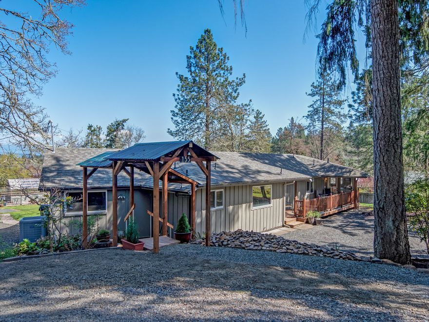 Rare find!  Sought-after South Eugene location.  Updated single level home on over 3/4 of an acre.  This custom home has been completely updated and meticulously maintained.  Featuring a gourmet kitchen with high end stainless appliances and hard surface counter-tops, bedroom separation, hardwood flooring and lots of natural light.  The numerous outbuildings include a detached studio/craft room, an enclosed and heated workshop, and several covered parking areas for boats, RV's, and extra vehicles.  Entertain your green-thumb with the fenced garden area complete with a large greenhouse!  Enjoy city views from your covered back porch and the close proximity to Safeway and the Edgewood Shopping Center.  A peaceful oasis in the heart of South Eugene. Call your favorite agent for a private showing.