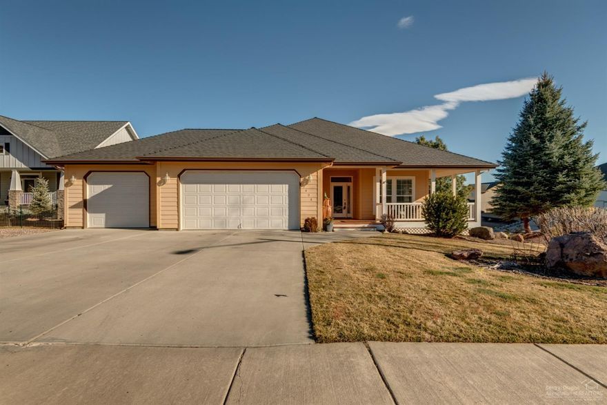 Beautifully finished home in Cascade View Estates with granite counters, travertine floors, tiled bathroom showers and floors, formal dining room and gourmet kitchen. 700+ feet of finished space downstairs. Light, bright and beautiful!