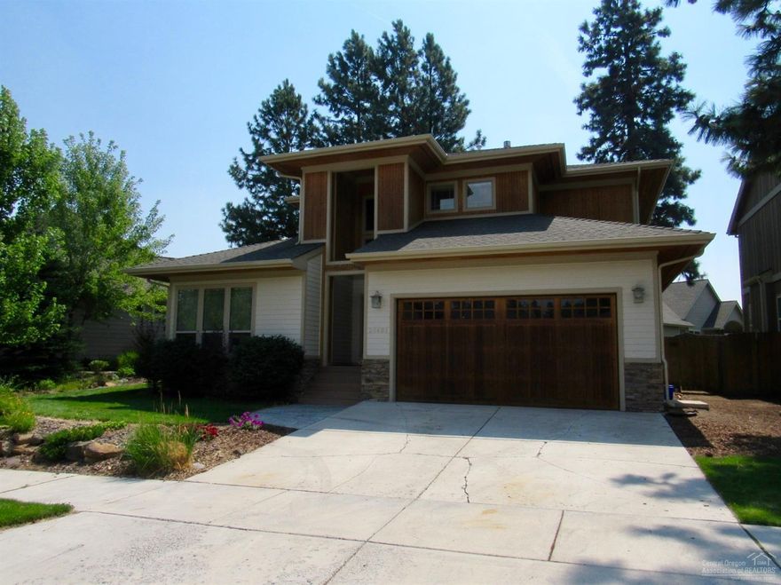 Gorgeous home in the Blue Ridge neighborhood in SE Bend. Master and office are on the main level. Coffered ceilings in formal living, formal dining and master bedroom. Very energy efficient with solar hot water and high efficiency furnace/ventilation system. Granite countertops, hickory cabinets, bamboo floors, and a vaulted entrance are just a few of the features. Fenced backyard with a stamped concrete patio. This one is worth checking out!
