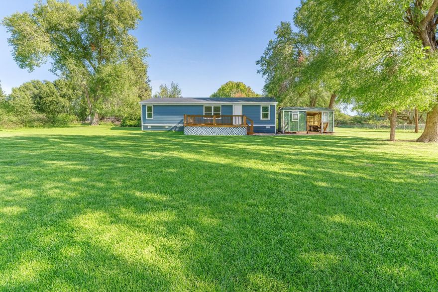 VA SPECIAL - 0% Down Financing Available! Home being sold as-is condition. 
Remodeled and move-in ready, this charming manufactured home offers comfort, style, and value on a spacious .38-acre lot surrounded by mature trees. Enjoy open outdoor space, extra storage, and a quiet setting close to town. Inside features new laminate and custom vinyl flooring, granite vanities, modern fixtures, and a cozy wood stove. The kitchen includes all-new stainless steel appliances, laminate counters, and a smart layout for everyday living. Major updates include a new roof (2025), new water heater (2023), and fresh interior paint. This home has been moved twice but qualifies for VA financing and 0% down programs (credit approval required). Perfect for first-time buyers or investors—affordable, updated, and ready to move in!