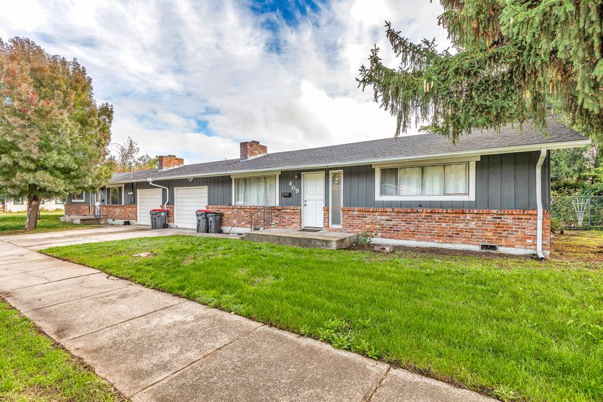 Charming, well-maintained duplex with laminate hardwoods throughout. Open concept with two spacious bedrooms in both units and one car garage. Great location and move-in ready condition. Must see!