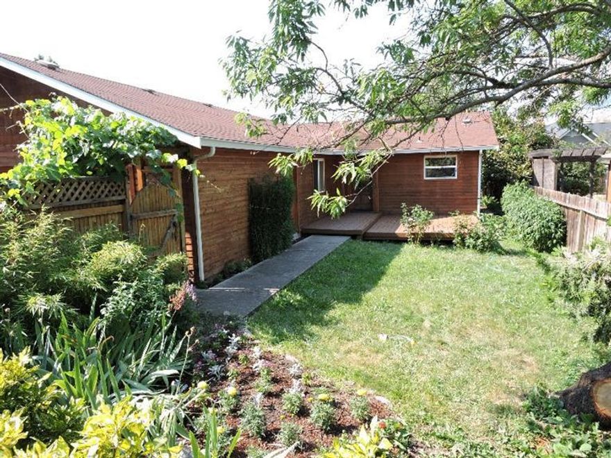 You will feel as if you are at home in the country when you visit this charming single level home with wood siding, lush grassy areas, colorful flower beds, grape vines and apple, peach, fig and almond trees. Enjoy relaxing on the refinished wooden decks with mountain views and then go inside this sweet home that has three bedrooms and the comfort and charm of oak floors, solid wooden doors and wooden built-in cabinets. The bathrooms and kitchen have colorful tile work that add to the charm. The home is on a flag lot that provides privacy and a quiet setting. Close to N. Mountain Park, Riverwalk neighborhood, bike path and not too far from downtown. New roof and recently oiled siding. A home you will love to live in...