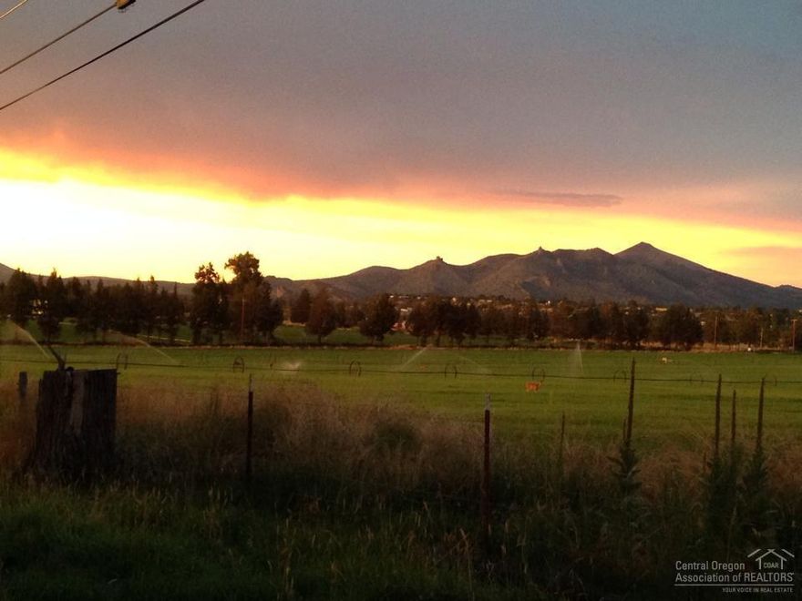 Beautiful one owner well maintained property. 3bed/2bath. Open floor plan with high ceilings and big windows. Kitchen is open with nice counter space and storage and great for entertaining. Lots of decking. Water feature in front of house. Nice horse set-up. Room for arena. Fenced and crossed fenced, small barn, horse shelters. Apple trees. Irrigation. Creek thru property. Private and secluded. Views of Mt. Hood and Monkey Face at Smith Rock.