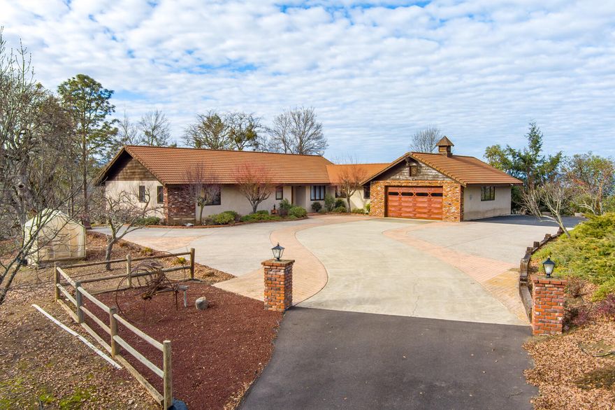 Incredible views from this private, knoll top setting.  Single level home with a large Island kitchen.  Granite counters, new cook top and tons of cabinet space.  Vaulted ceilings in the great room with amazing top-of-the-world views of the Table Rocks.  New exterior stucco top coat.  Tile Roof and all wood windows.  Updated bathrooms with granite counters, tile showers, and tile floors.  16 gallon per minute well with an 1,800 gallon holding tank.  Newer heating pump, water heater, and electrical panel.  Oversized two-car garage.  Paved driveway with an abundance of parking, including RV parking for any size.  There is also a small outbuilding and a green house.  This is a one owner home that has been very well maintained.