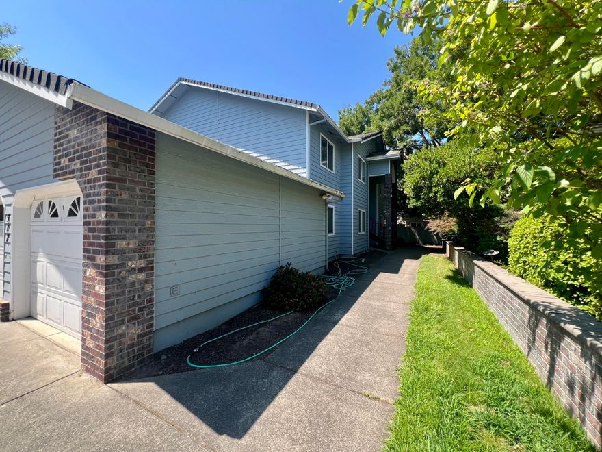 Attractive 1996-built quadplex in a well-maintained Central Point neighborhood. This 4,232 SF two-story property features a brick-and-siding exterior, mature landscaping, and a wide driveway with private single-car garages for each of the four 2BD/2BA units. All units have separate gas/electric meters, no HOA fees, and professional management. Current rents are $1,295/month per unit with long-term tenants in three units (since 2016 and 2018). Located near Crater High School, Don Jones Memorial Park, and shopping, with quick I-5 access to Medford and the Rogue Valley International Airport. Potential to increase gross rental income over time.