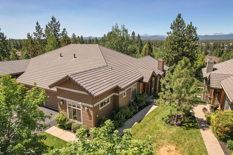 Stunning NW Bend townhome, completely remodeled with breathtaking attention to detail. 2120 sqft includes 2 bedrooms, 2.5 baths, plus an office/den. The open floor plan boasts soaring ceilings, natural stone clad wall accents, oak flooring, and reclaimed hand hewn wood beam accents throughout. Chef's kitchen features Carrera marble & granite countertops, center island & breakfast bar, Thermador appliances, & custom cabinetry. The spacious great room boasts a dining area, stone surround fireplace, custom built-ins, and picture windows. The master suite has private access to the back deck, walk-in closet, and a giant walk-in shower. Guest bedroom includes an ensuite bath with a beautifully tiled shower. Expansive covered deck is the perfect place to relax or entertain, and enjoy the seasonal Cascade Mountain views. This home truly belongs in a magazine! Great location, just minutes to river access, Downtown Bend, the Old Mill, and Northwest Crossing.