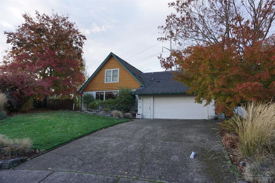 Custom built 2,234sf home on.27 acres in quiet cul de sac.Features great room-living/dining,large kitchen,wood burning fireplace and sliding door onto patio.Laundry room,storage,built-in desk.3 generous sized bedrooms located upstairs,vaulted ceilings,large closets;3rd bedroom/bonus over garage would make nice master,2 full bathrooms,shower/tub,2 sinks.New carpet, flooring, interior paint downstairs.Double car garage, workshop, storage.Manicured front/back fenced yard, fruit trees. Close to schools + more.