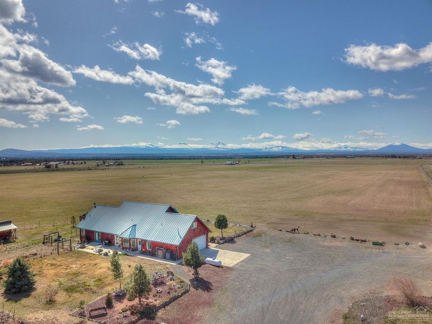 Unique opportunity to own & operate a successful Orchard Grass farm in the heart of Central Oregon. Located just south of Maragas Winery & just north of the Crooked River Gorge, turn key property w/360 degree views. Over 72 acres of irrigated crops, 2 pivots & handline to fill in the gaps. Hay storage w/easy truck access, addtl storage buildings, 40 ft 4 bay machine whed & 40x96 shop w/2 14' rollup doors, concrete floor, 220 power, septic, water & storage. Vacation rental potential, second homesite & FLAT!