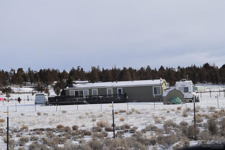 Neat and tidy. great location, perfect equestrian dirt w/few rocks, fabulous mountain views, quiet and growing large acreage neighborhood. Paved road w/in 600+/- ft.