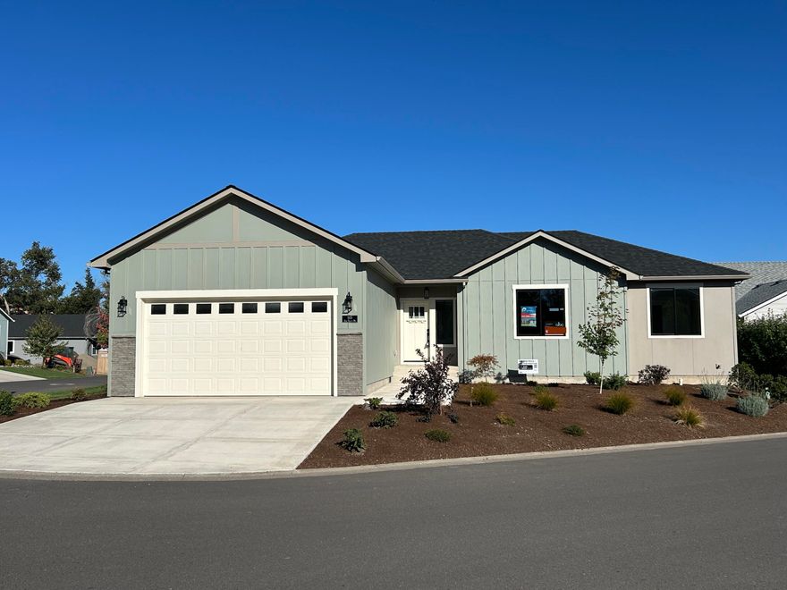 This one-of-a-kind single-story 3-bed/2-bath home designed and built by Rispoli Design & Build features 1,545 sq ft (per builder) of living space, 100% Hardie cement non-combustible siding & trim exterior, and is conveniently located in a 55+ community. The open floor plan features high-efficiency ductless mini-split heating & cooling system, quartz countertops, high-efficiency heat pump water heater, LVP flooring, full door & window trim, porcelain tile, s/s appliances, solid-wood Diamond cabinets with soft-close doors & hidden hinges, fully finished & insulated garage w/insulated garage door & wi-fi opener, charging station, fencing, professional landscaping, fenced back yard, and more! Energy Star and Energy Trust certification ensures energy efficiency. HOA dues of $185/month include garbage, landscape maintenance, clubhouse and pool.   Ready for immediate occupancy.