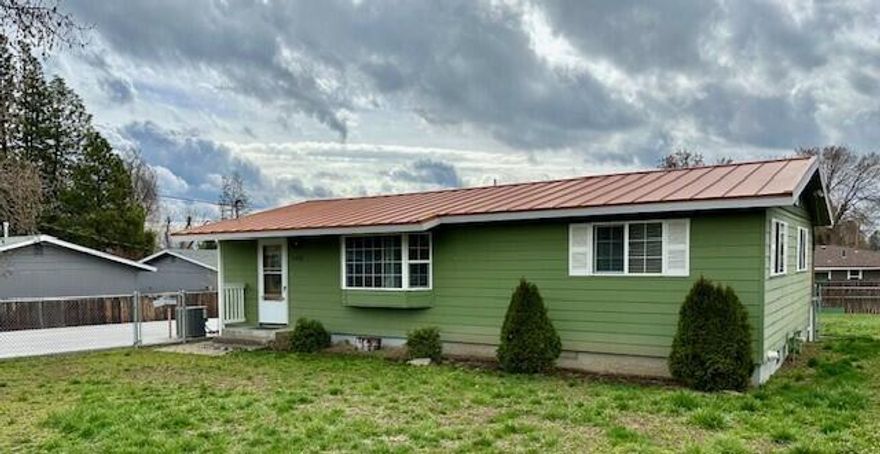 Very nice ranch style home in the South Suburbs!! Come take a peak at this 2 bedroom, 2 bathroom home arranged on .27 acres featuring open concept kitchen that has been updated with ample amounts of nice cabinetry, gas oven range, recessed lighting, and neutral counter tops, dining and living room with tons of natural lighting, newer vinyl windows, and newer carpet and tile throughout. Stackable washer and dryer are included with the home as well as all kitchen appliances. Outside features a fully fenced yard with greenhouse, RV parking, a large concrete driveway and a 20x30 SHOP with a roll up door and side door.  Wheel chair ramp and metal roof are a couple of other great positives this home has to offer.  This home is move in ready and could be the perfect fit for you. Schedule your showing today!!