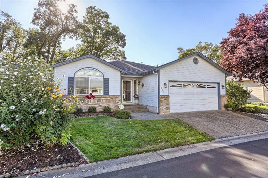 This cheerful 3 Bed/2 bath home in Oak Valley 55 & over community is very comfortable, clean & shows beautifully! Open floor plan w/vaulted ceiling in living room & cozy corner gas fireplace with brick hearth. French doors open to a lovely & spacious covered, screened-in porch for enjoying those gorgeous spring, summer and fall evenings. Enjoyable dining room w/coffered ceiling, well designed, light & bright kitchen w/pantry & easy access to garage & laundry room. Master bedroom w/ walk-in closet and spacious bath. Manicured mature terraced gardens & trees. Finished 2-car garage. Association fees $150/month. HOA fees include front yard landscaping, garbage pick-ups, use of club house & pool.