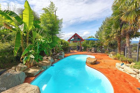 Tiny photo for 921 NE Beacon Drive, Grants Pass, OR 97526 (MLS # 220224499)